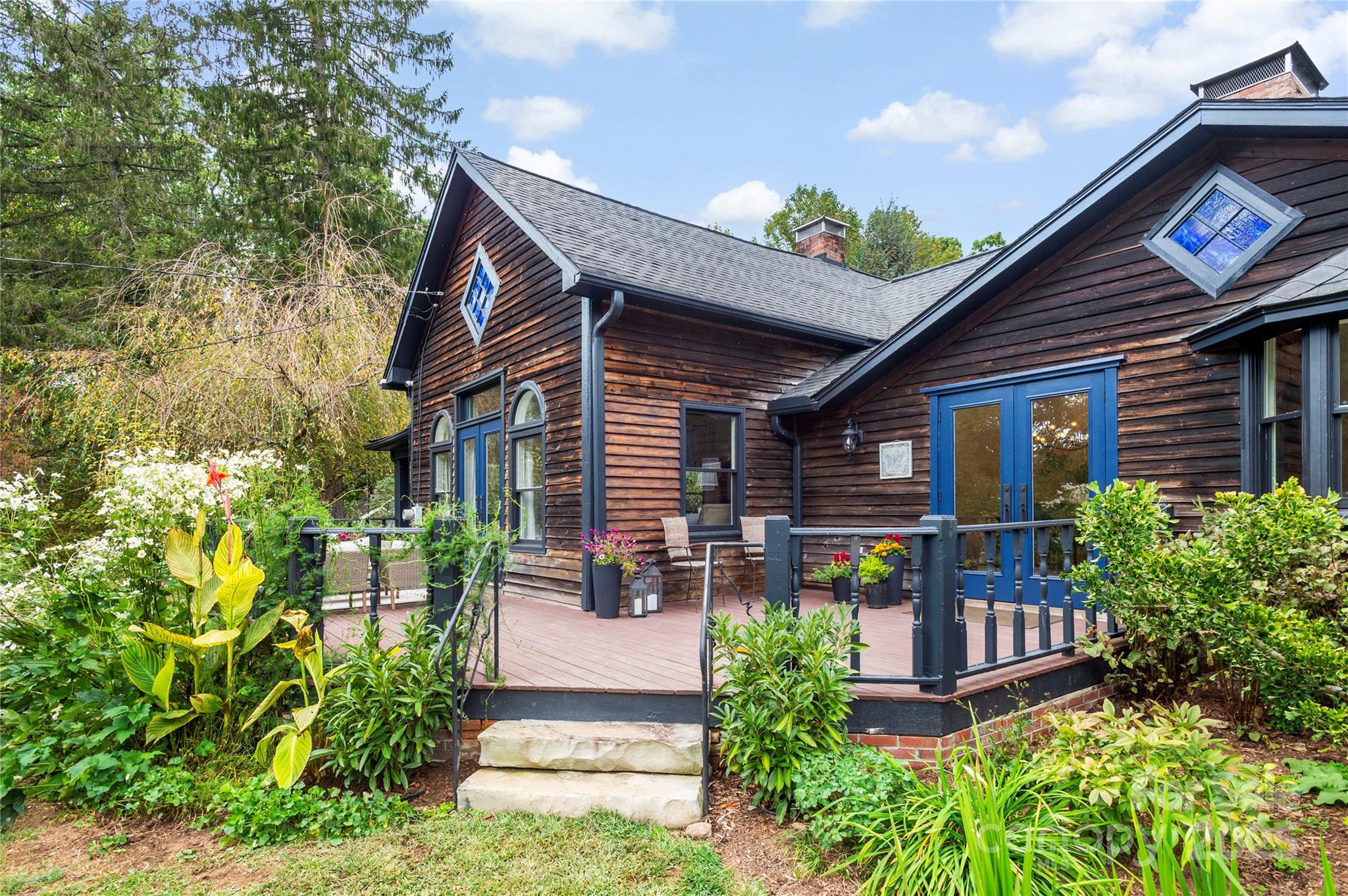 528 Padgettown Road Black Mountain, NC 28711 - Photo 38 of 43 a front view of a house with garden