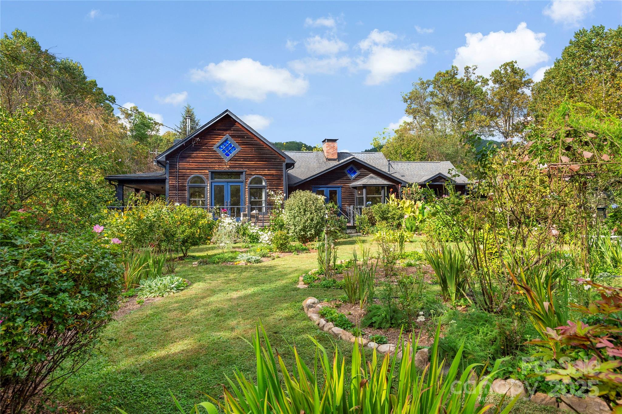 528 Padgettown Road Black Mountain, NC 28711 - Photo 40 of 43 a front view of a house with a yard