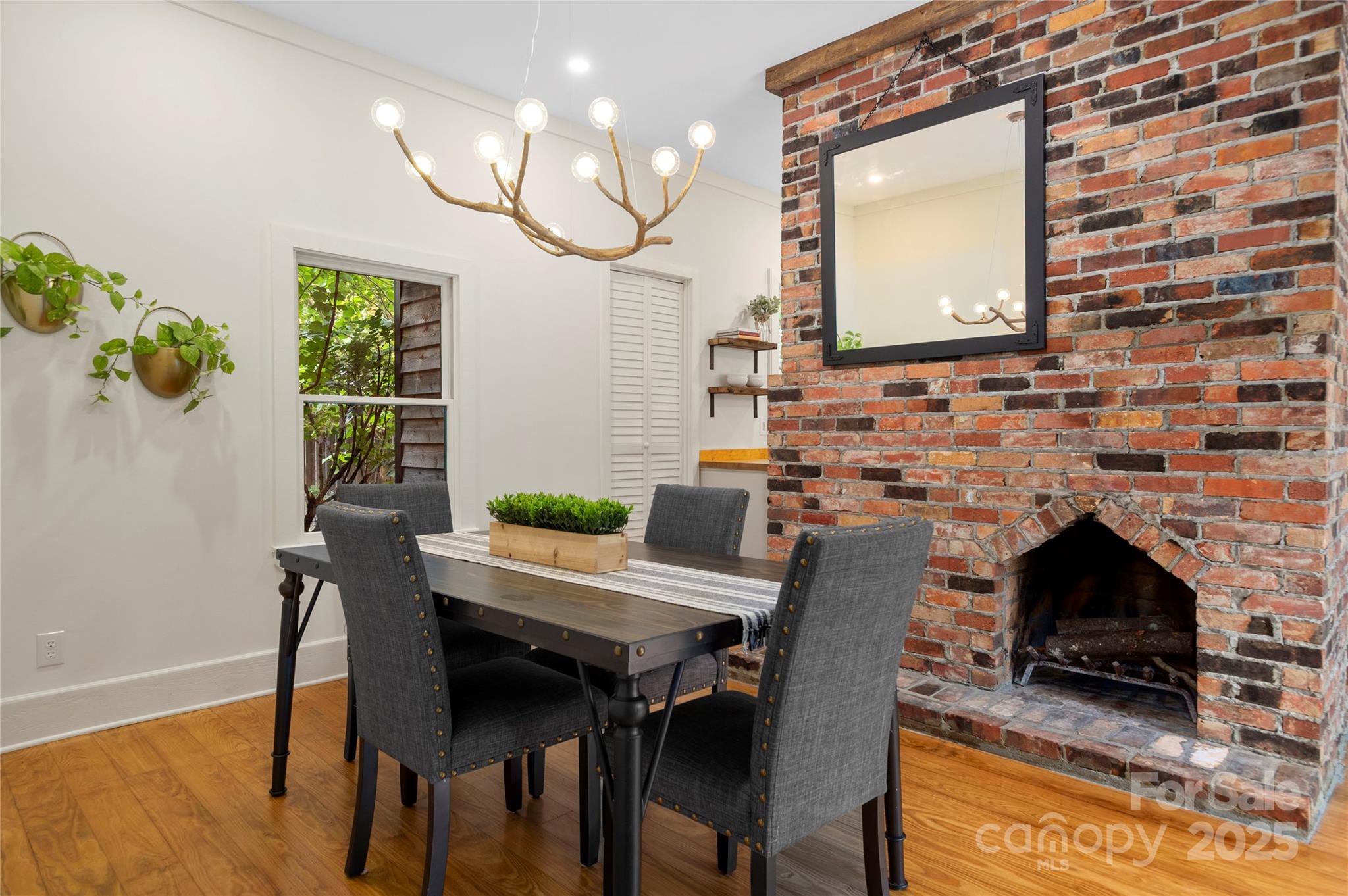 528 Padgettown Road Black Mountain, NC 28711 - Photo 6 of 43 a view of a dining room with furniture and wooden floor
