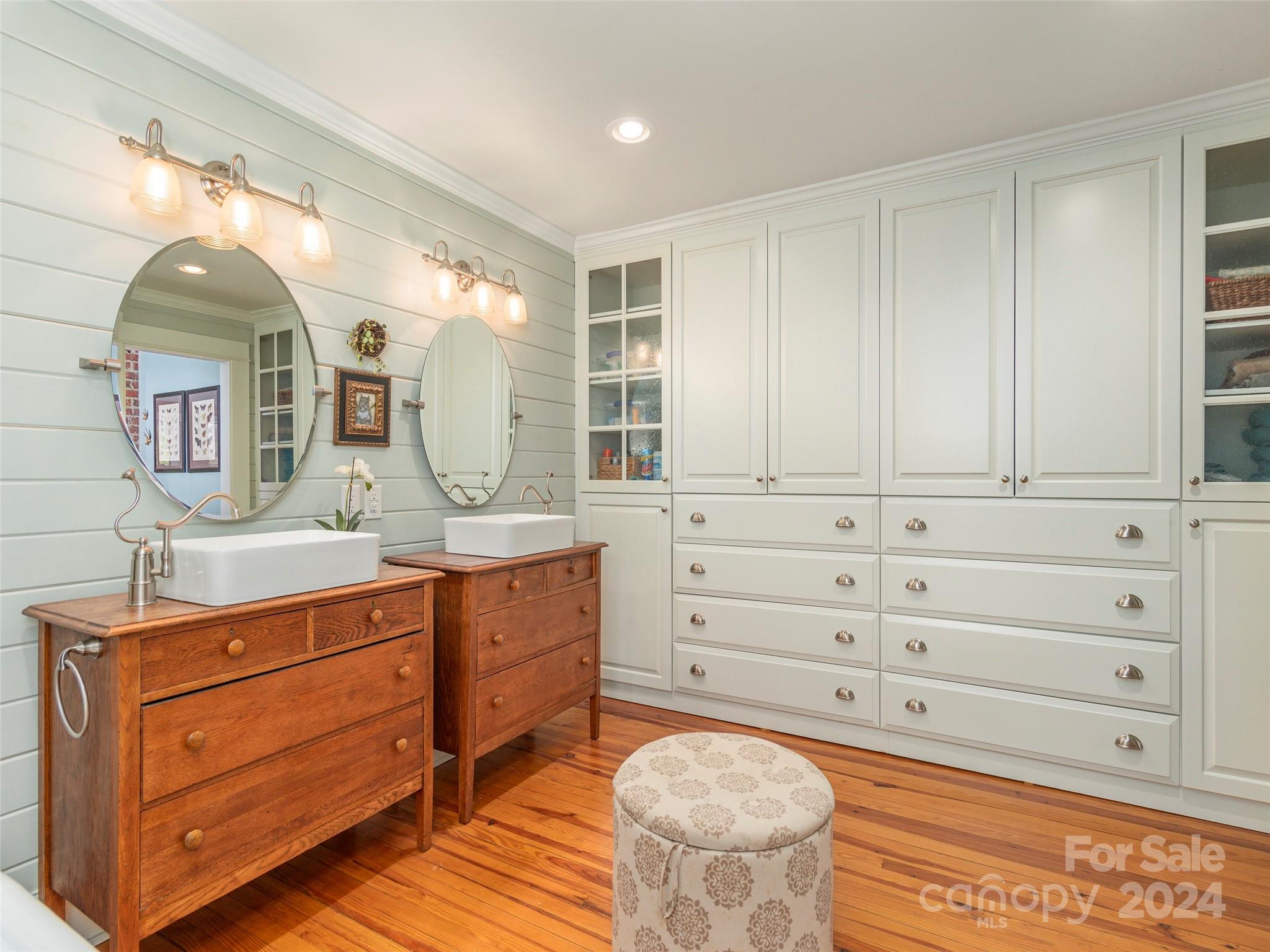 952 Thompson Cove Road Clyde, NC 28721 - Photo 23 of 43 a spacious bathroom with a granite countertop sink a mirror and a