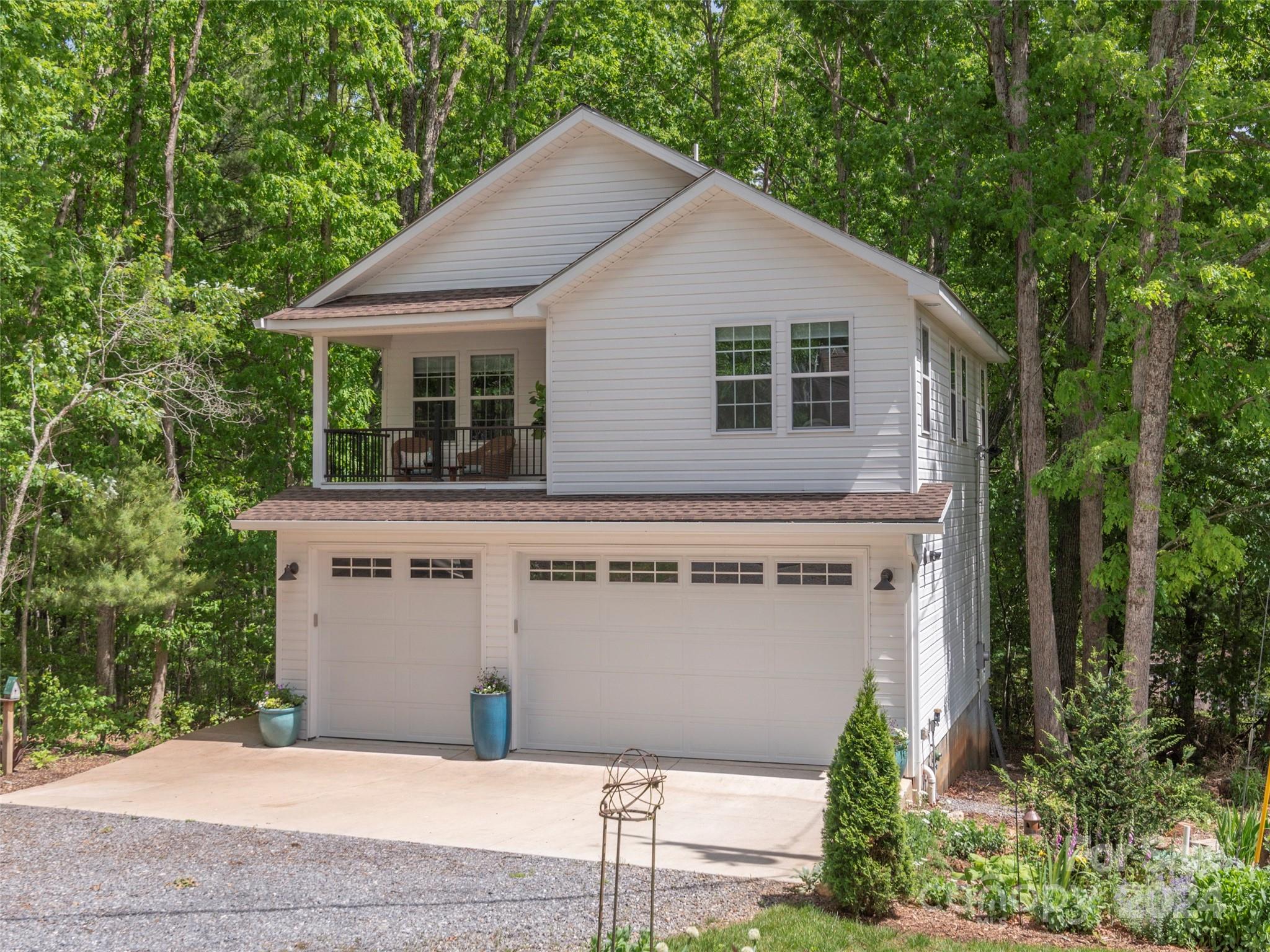 952 Thompson Cove Road Clyde, NC 28721 - Photo 32 of 43 a view of a house with garage