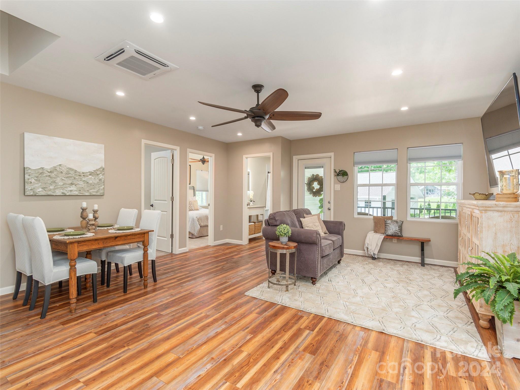 952 Thompson Cove Road Clyde, NC 28721 - Photo 33 of 43 a living room with furniture and wooden floor