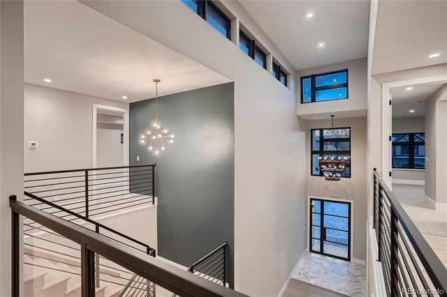 a view of a hallway with seating area
