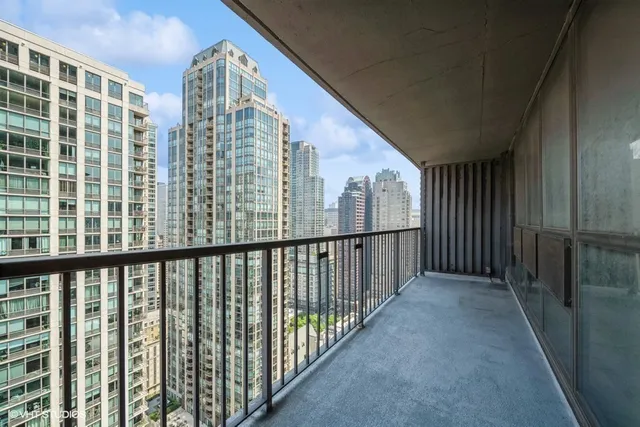 a view of a balcony with staircase
