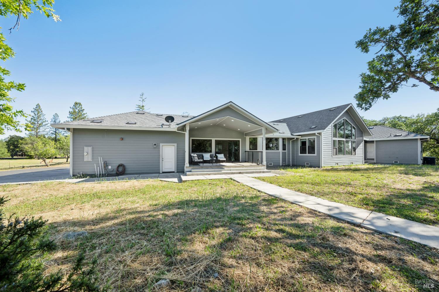4665 Upper Ridge Road Santa Rosa, CA 95404 - Photo 59 of 71 a view of a house with swimming pool and a yard