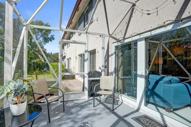 a house view with a seating space and a chair