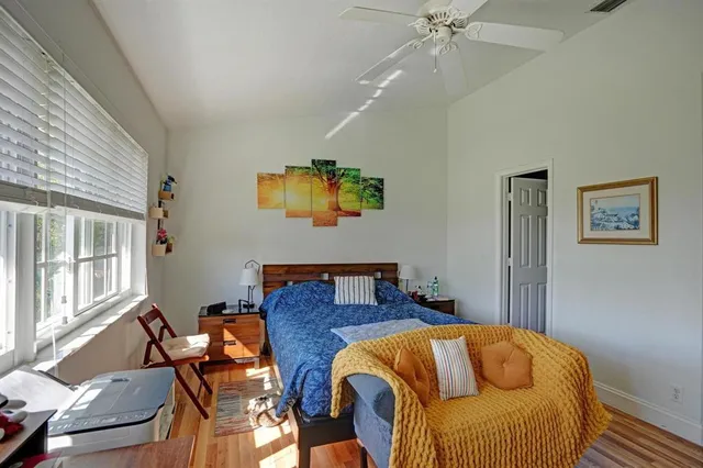 a spacious bathroom with a double vanity sink mirror and toilet