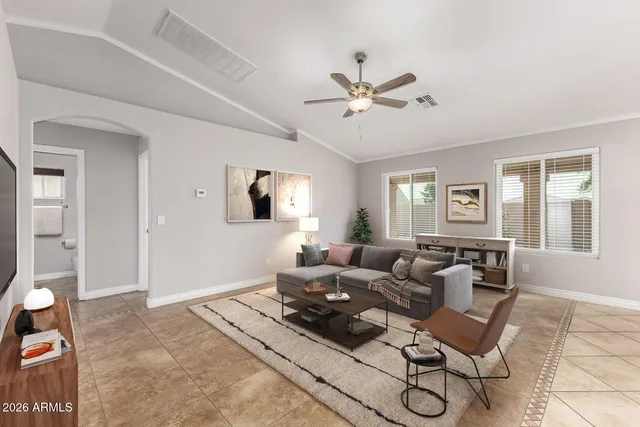 a kitchen with a stove a sink and a refrigerator