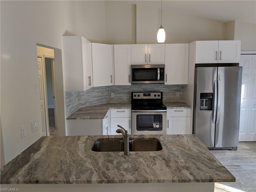340 9th Street Southwest Naples, FL 34117 - Photo 1 of 10 KITCHEN
