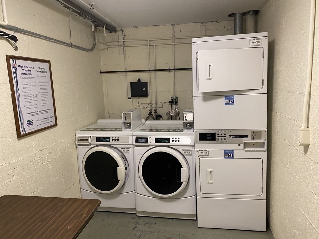 79 Nicholas Road, Unit J Framingham, MA 01701 - Photo 27 of 29 a utility room with dryer and washer