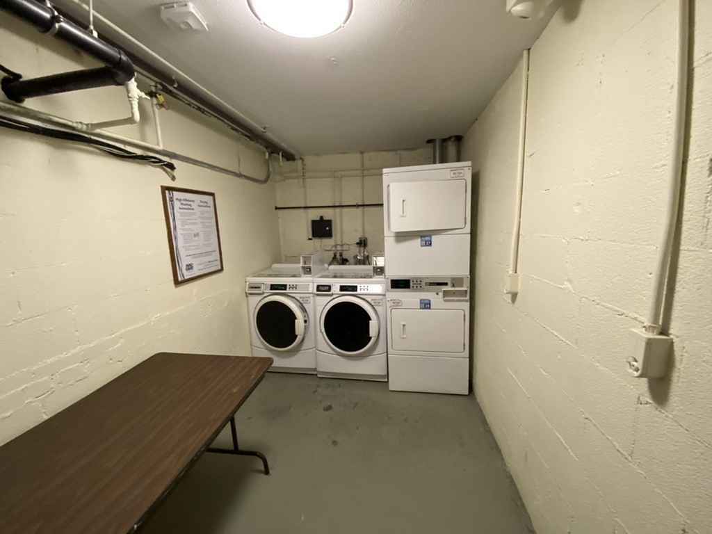 79 Nicholas Road, Unit J Framingham, MA 01701 - Photo 29 of 29 a utility room with dryer and washer