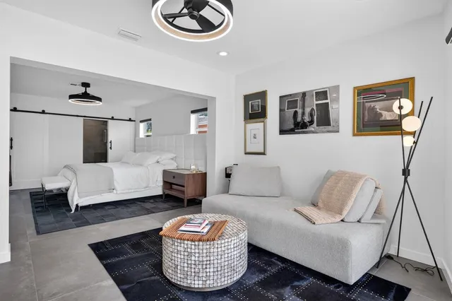 a living room with furniture and a couch