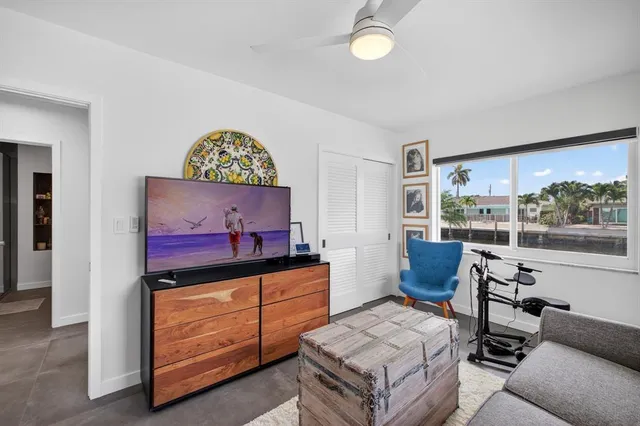 a living room with furniture and a window