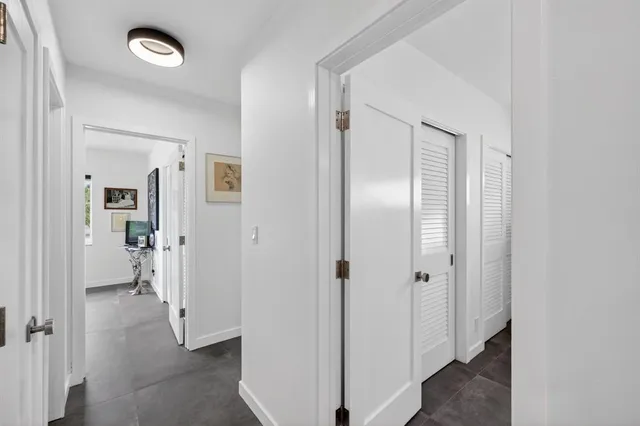 a view of a swimming pool with a yard