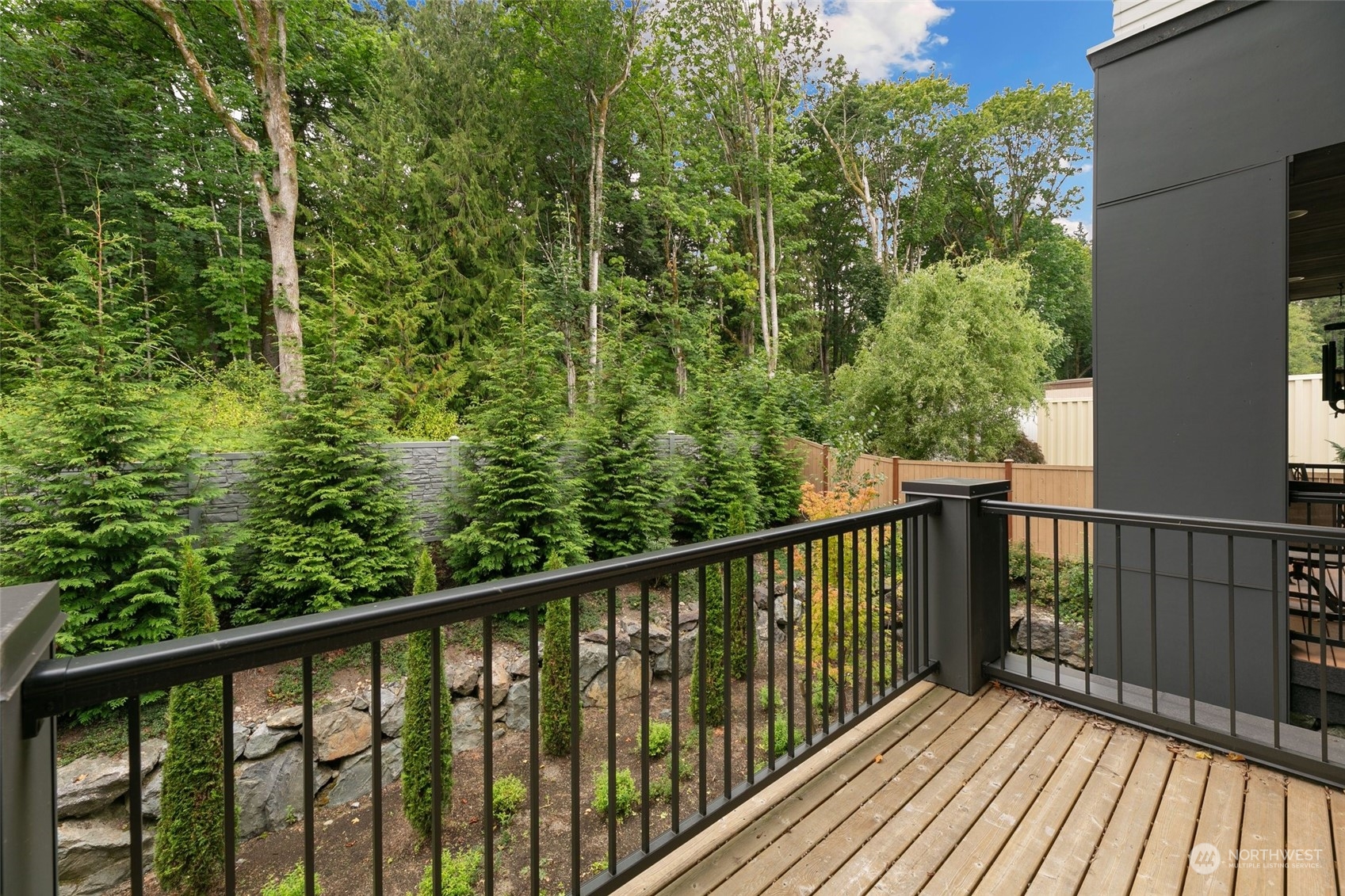 23626 5th Avenue Southeast, Unit C Bothell, WA 98021 - Photo 13 of 39 a view of a balcony with wooden floor