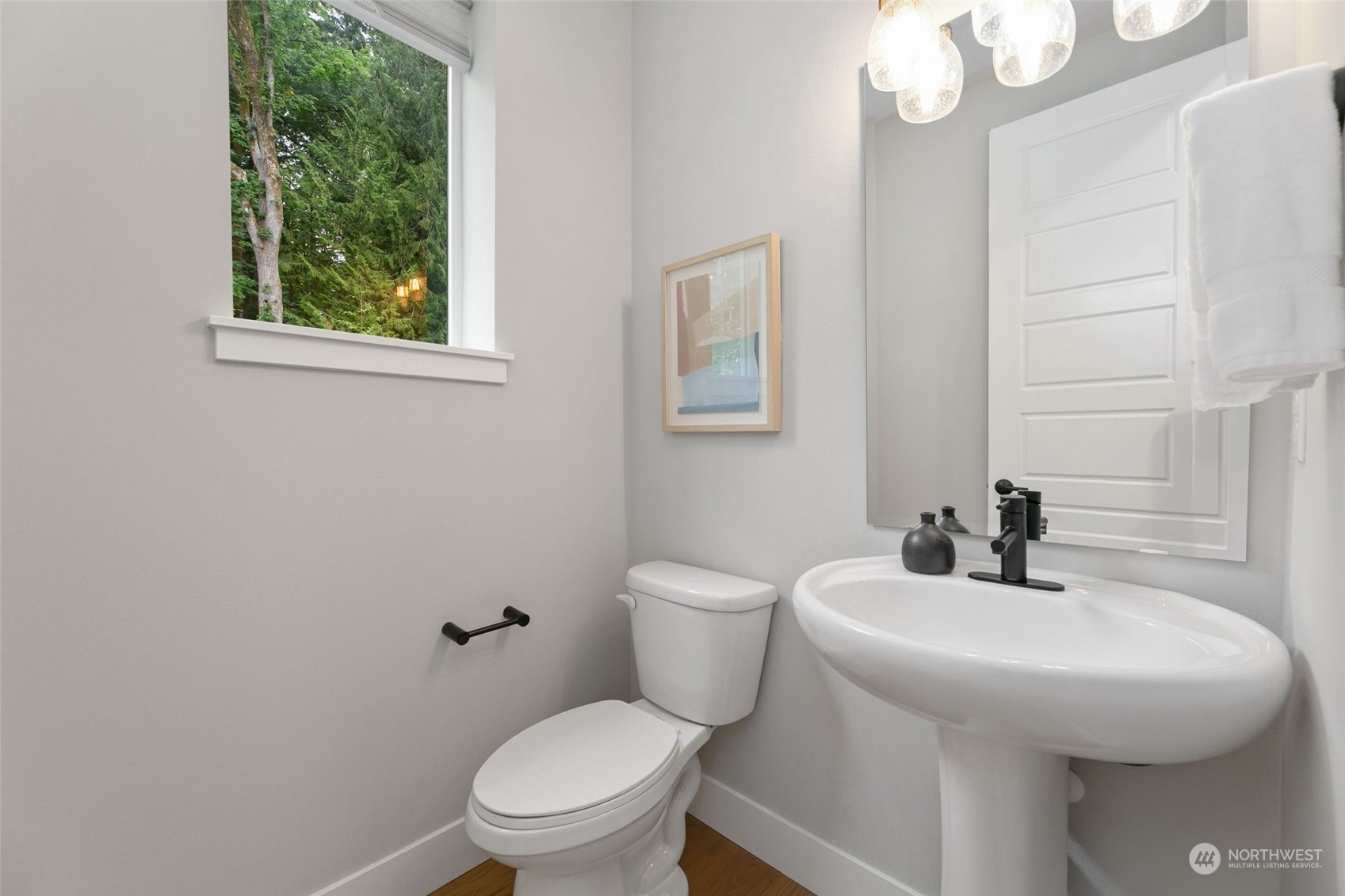 23626 5th Avenue Southeast, Unit C Bothell, WA 98021 - Photo 17 of 39 a bathroom with a toilet a sink and a mirror