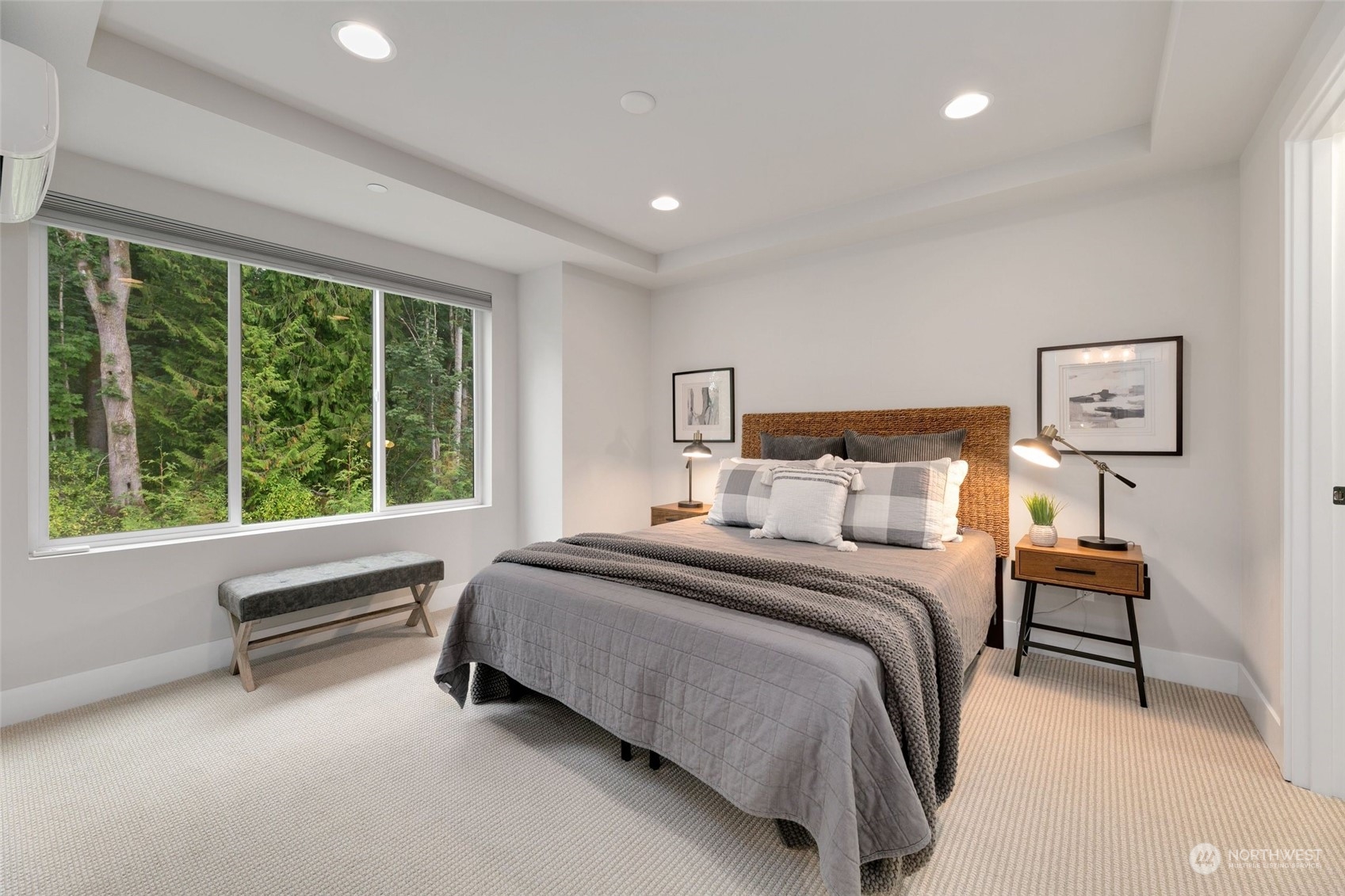 23626 5th Avenue Southeast, Unit C Bothell, WA 98021 - Photo 19 of 39 a spacious bedroom with a bed and a large window