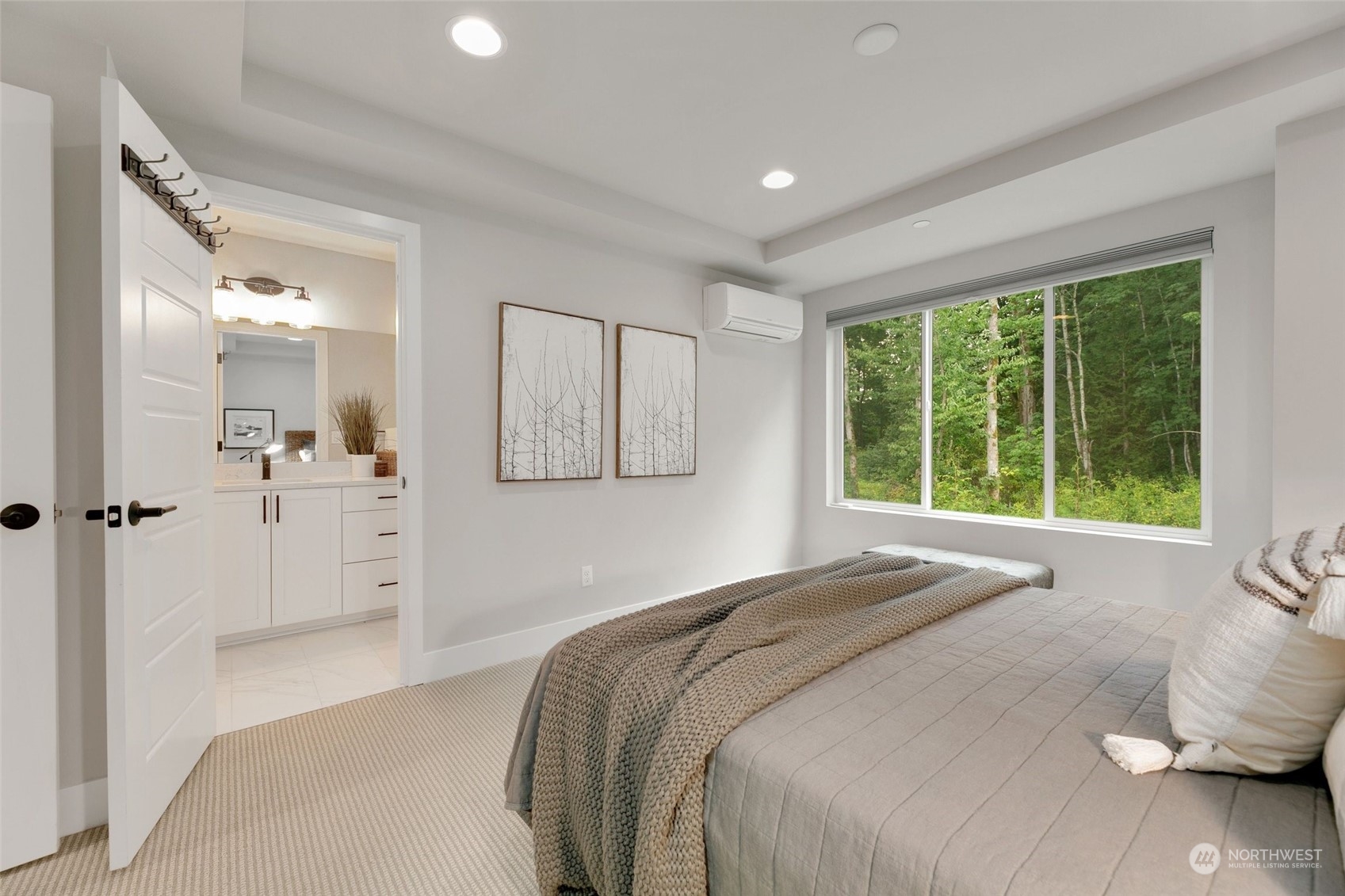 23626 5th Avenue Southeast, Unit C Bothell, WA 98021 - Photo 20 of 39 a bedroom with a large bed and a window