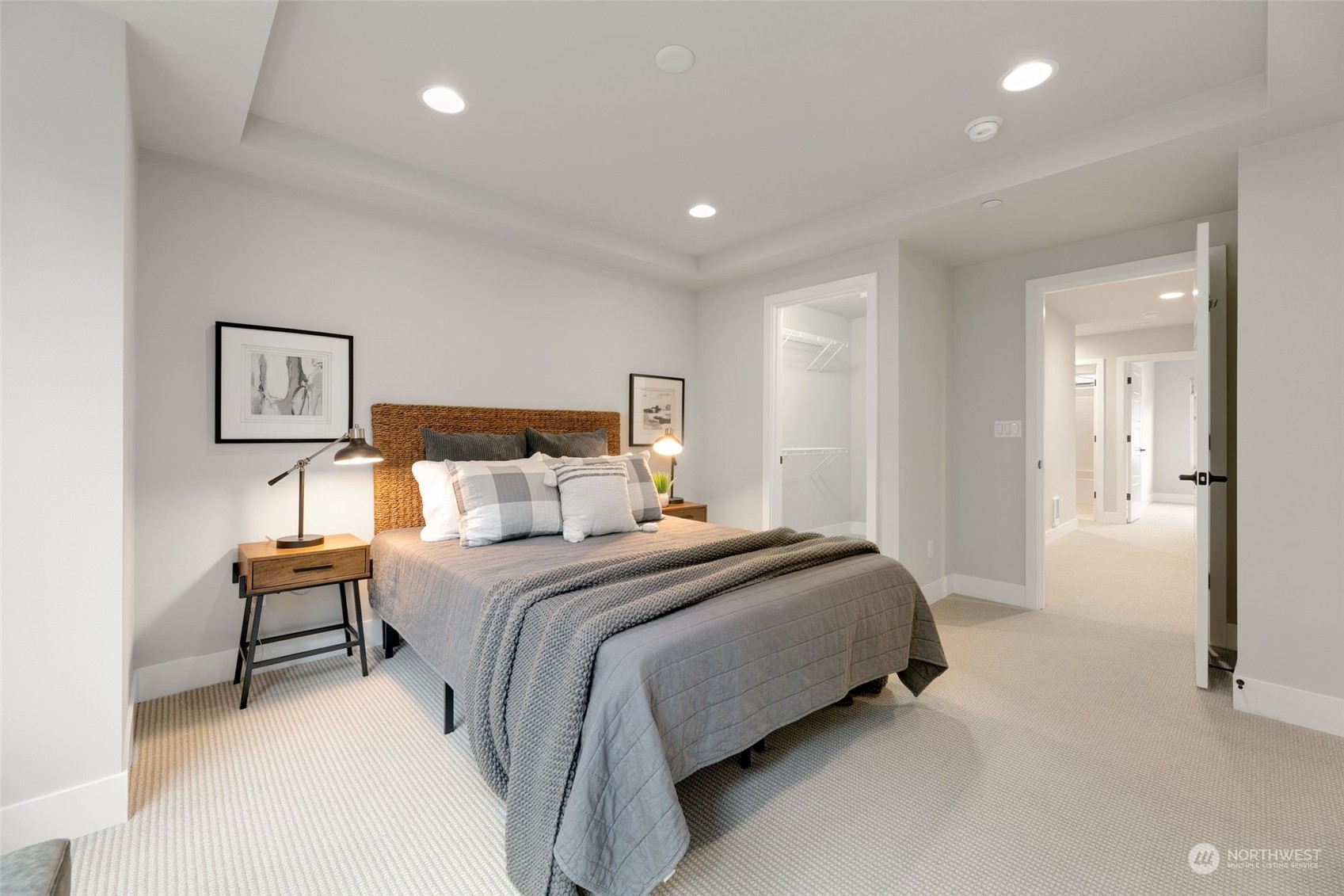 23626 5th Avenue Southeast, Unit C Bothell, WA 98021 - Photo 24 of 39 a bedroom with a bed and a night stand