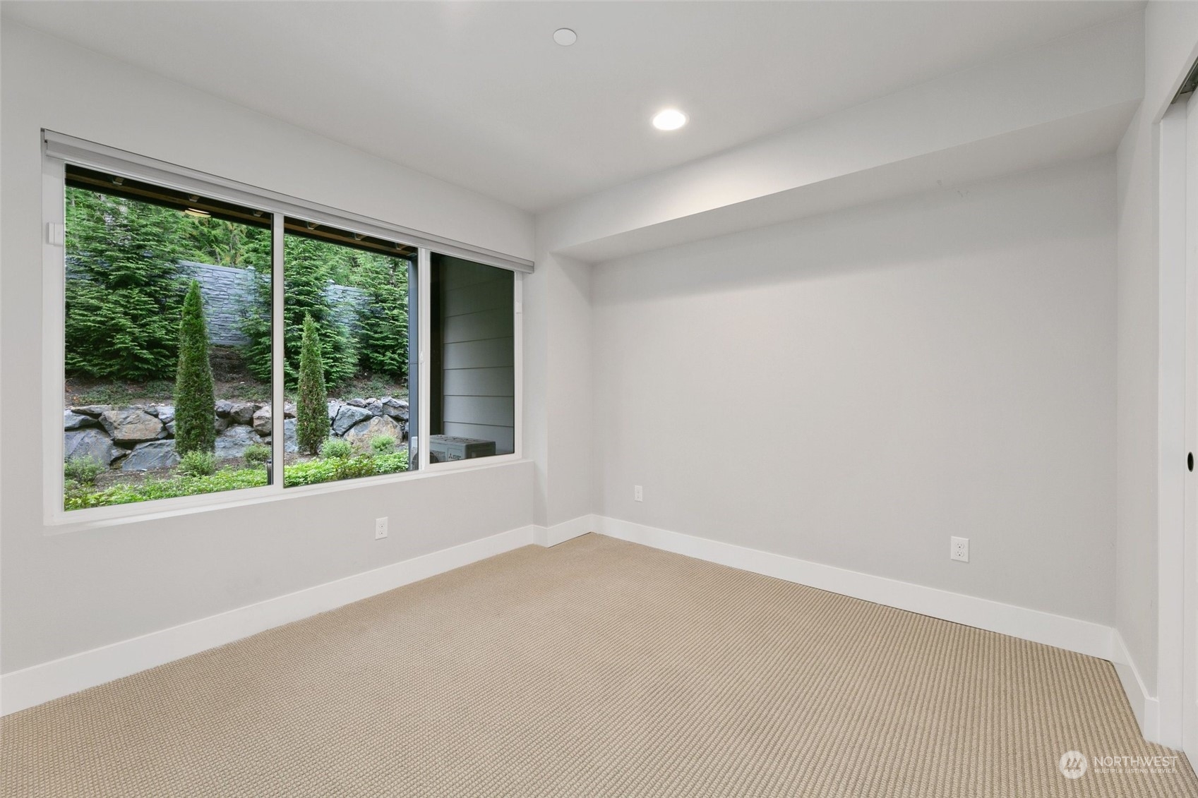 23626 5th Avenue Southeast, Unit C Bothell, WA 98021 - Photo 30 of 39 en empty room with large windows