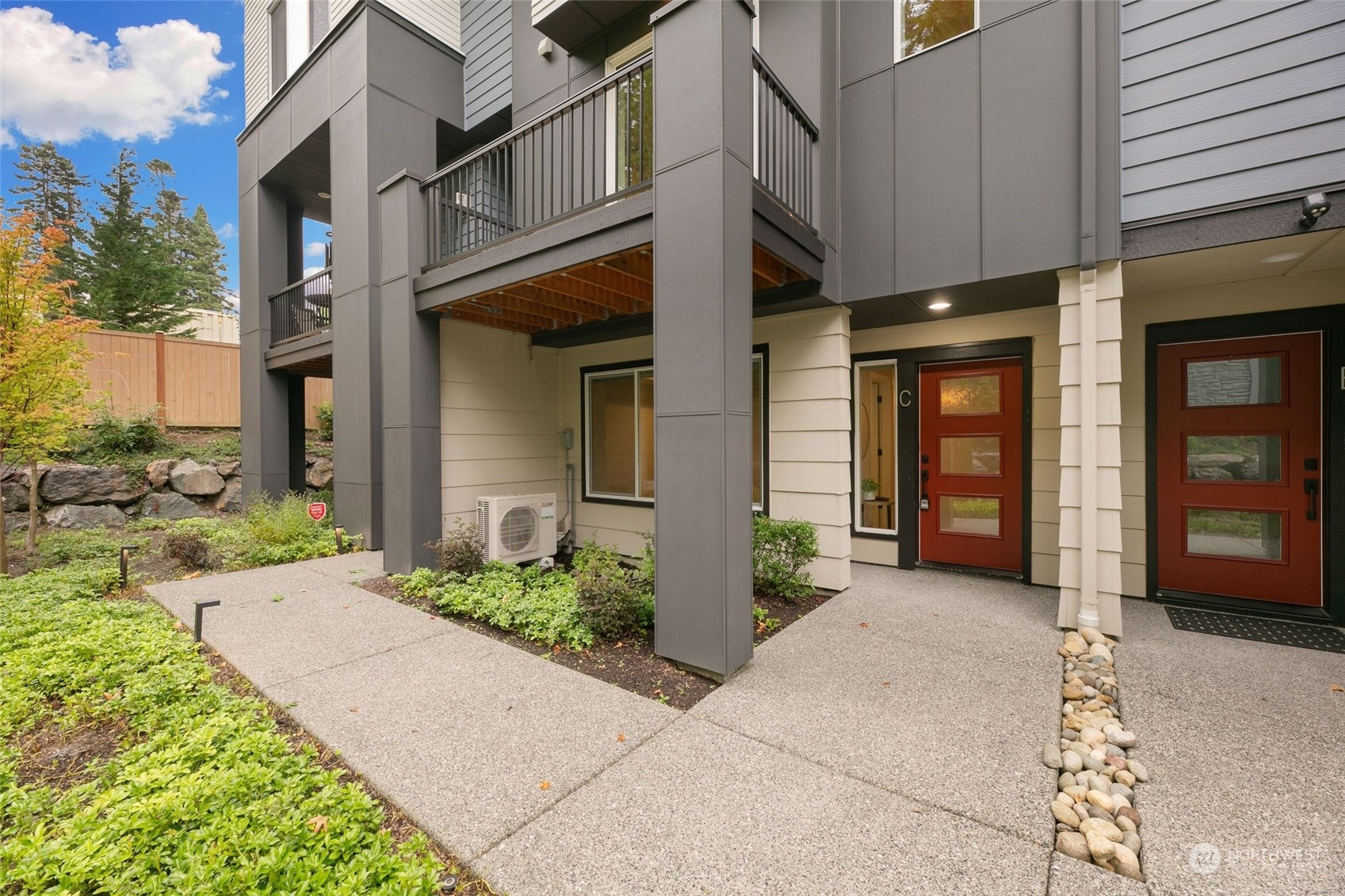 23626 5th Avenue Southeast, Unit C Bothell, WA 98021 - Photo 37 of 39 a view of a building with potted plants