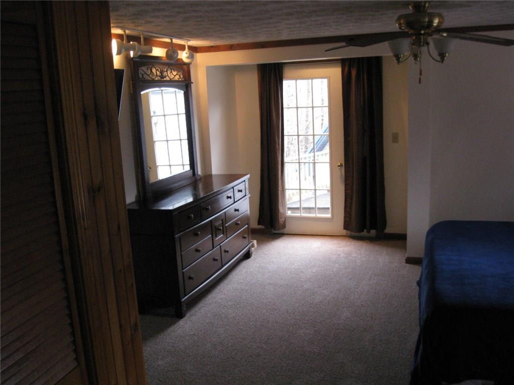 362 Choate Road Windsor, ME 04363 - Photo 12 of 27 Master BR deck access
