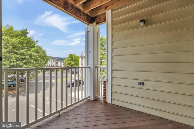 a picture of a bench in front of a wall