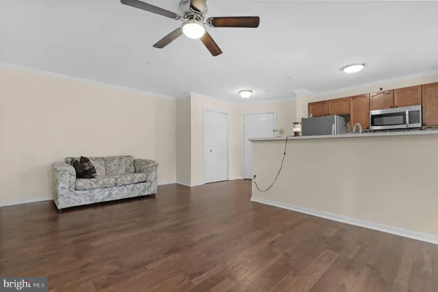 a view of workspace with wooden floor and window