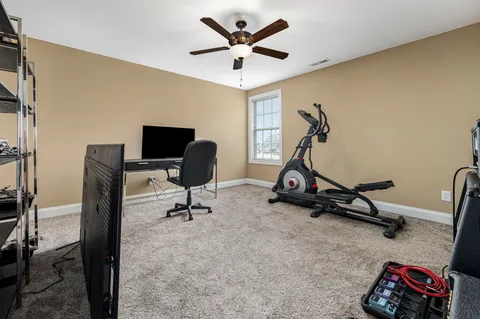 a view of a workspace with gym equipment