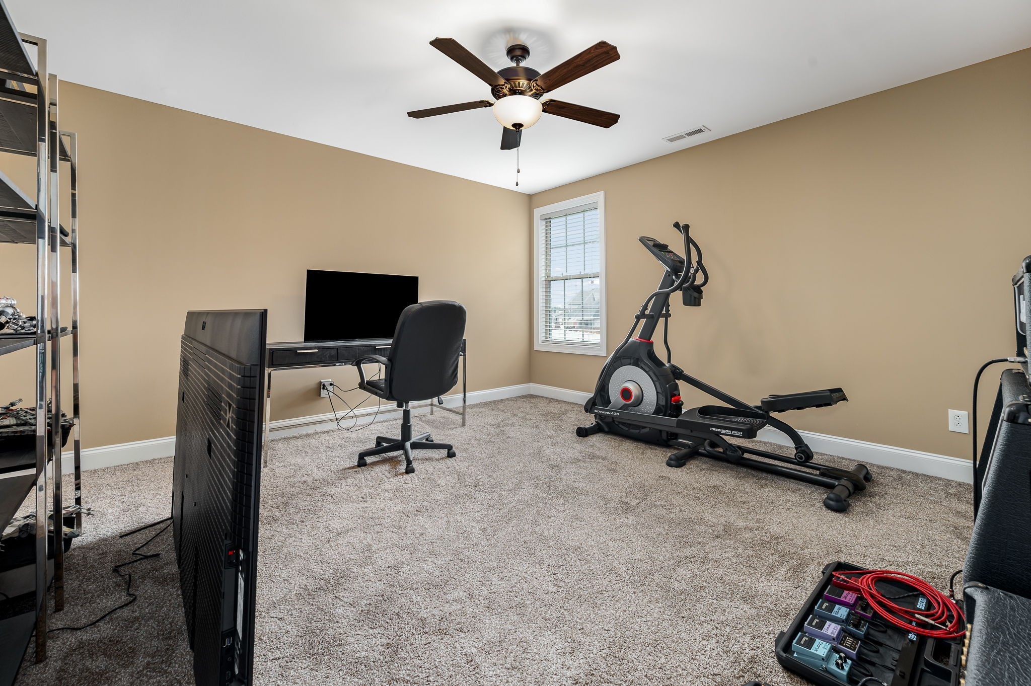 2816 Lightning Bug Drive Murfreesboro, TN 37129 - Photo 11 of 23 a view of a workspace with gym equipment