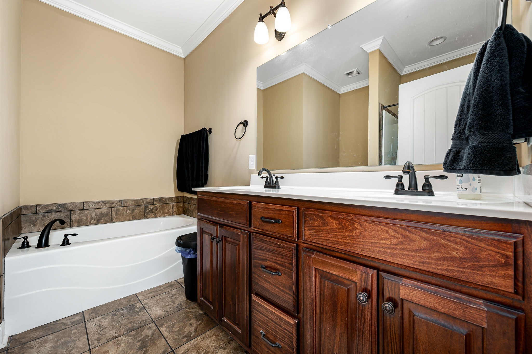 2816 Lightning Bug Drive Murfreesboro, TN 37129 - Photo 9 of 23 a bathroom with a sink and a bathtub