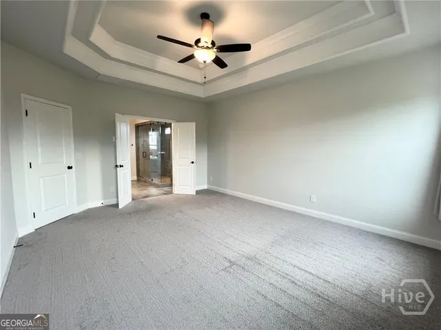 a bathroom with a shower and a sink