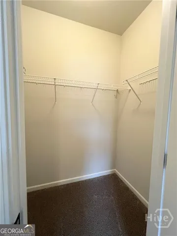 a bathroom with a sink vanity and a mirror