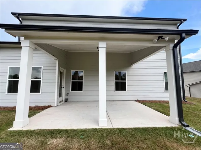 a view of a lake with a big yard