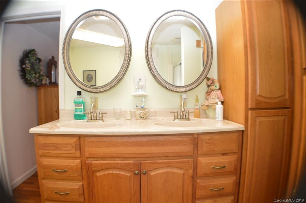 2395 Cove Road Rutherfordton, NC 28139 - Photo 4 of 25 a bathroom with a sink and a mirror