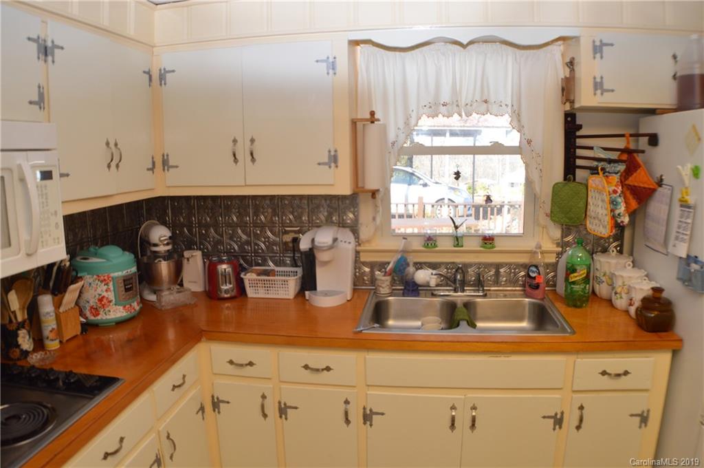 2395 Cove Road Rutherfordton, NC 28139 - Photo 9 of 25 a kitchen with counter top space and wooden floor