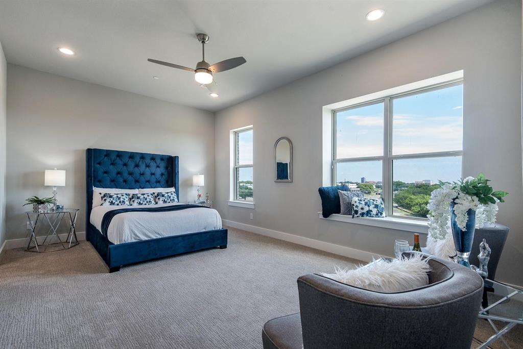770 North Plano Road, Unit 303 Richardson, TX 75081 - Photo 10 of 26 This spacious room features light gray walls, recessed lighting, and a ceiling fan
