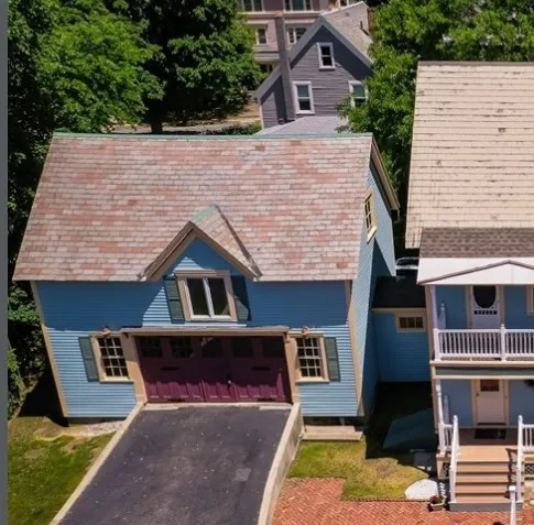 a front view of a house with yard