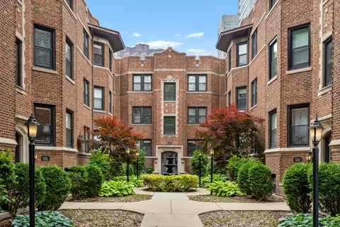 a front view of a multi story residential apartment building