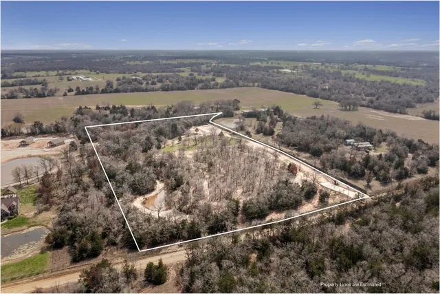 an aerial view of beach and residential houses