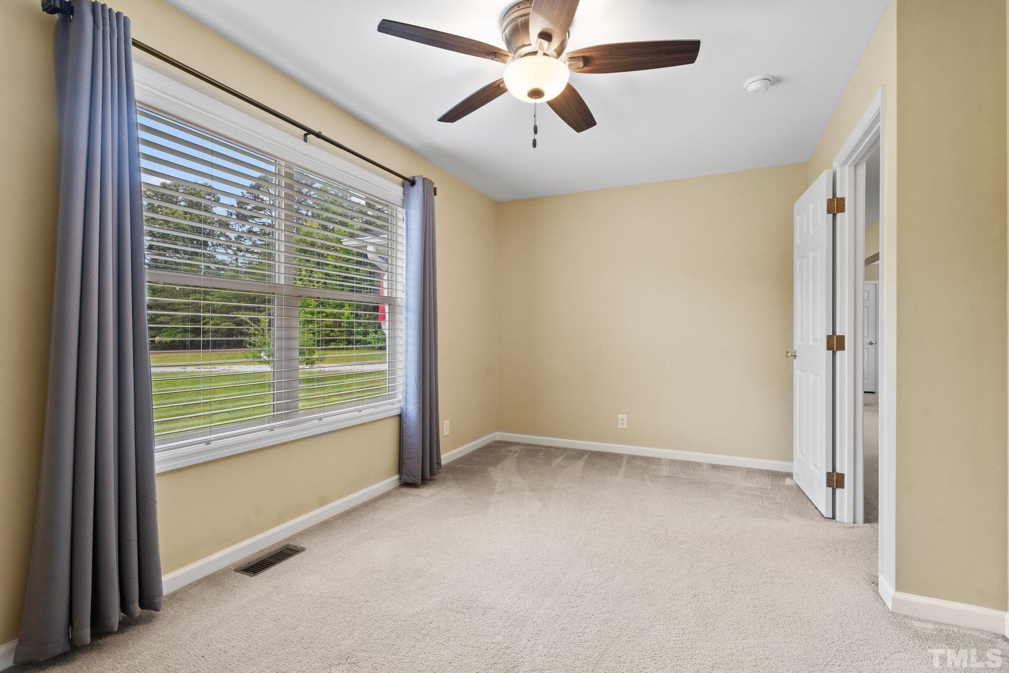 2613 Old Allensville Road Roxboro, NC 27574 - Photo 23 of 35 a view of an empty room with a window