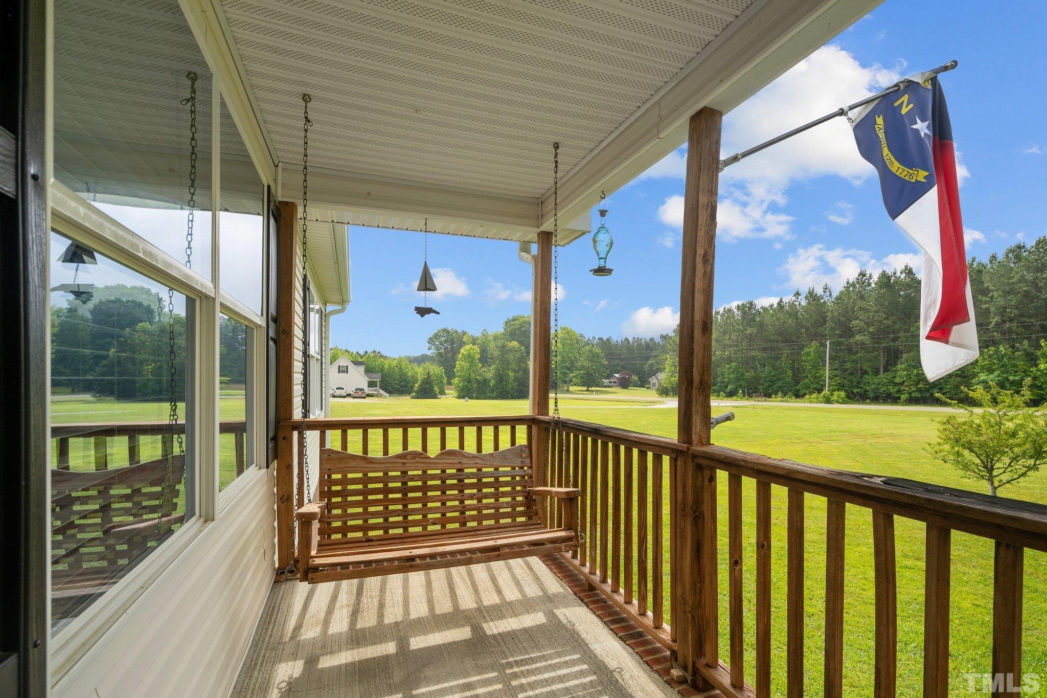 2613 Old Allensville Road Roxboro, NC 27574 - Photo 5 of 35 a view of a two chairs in the balcony