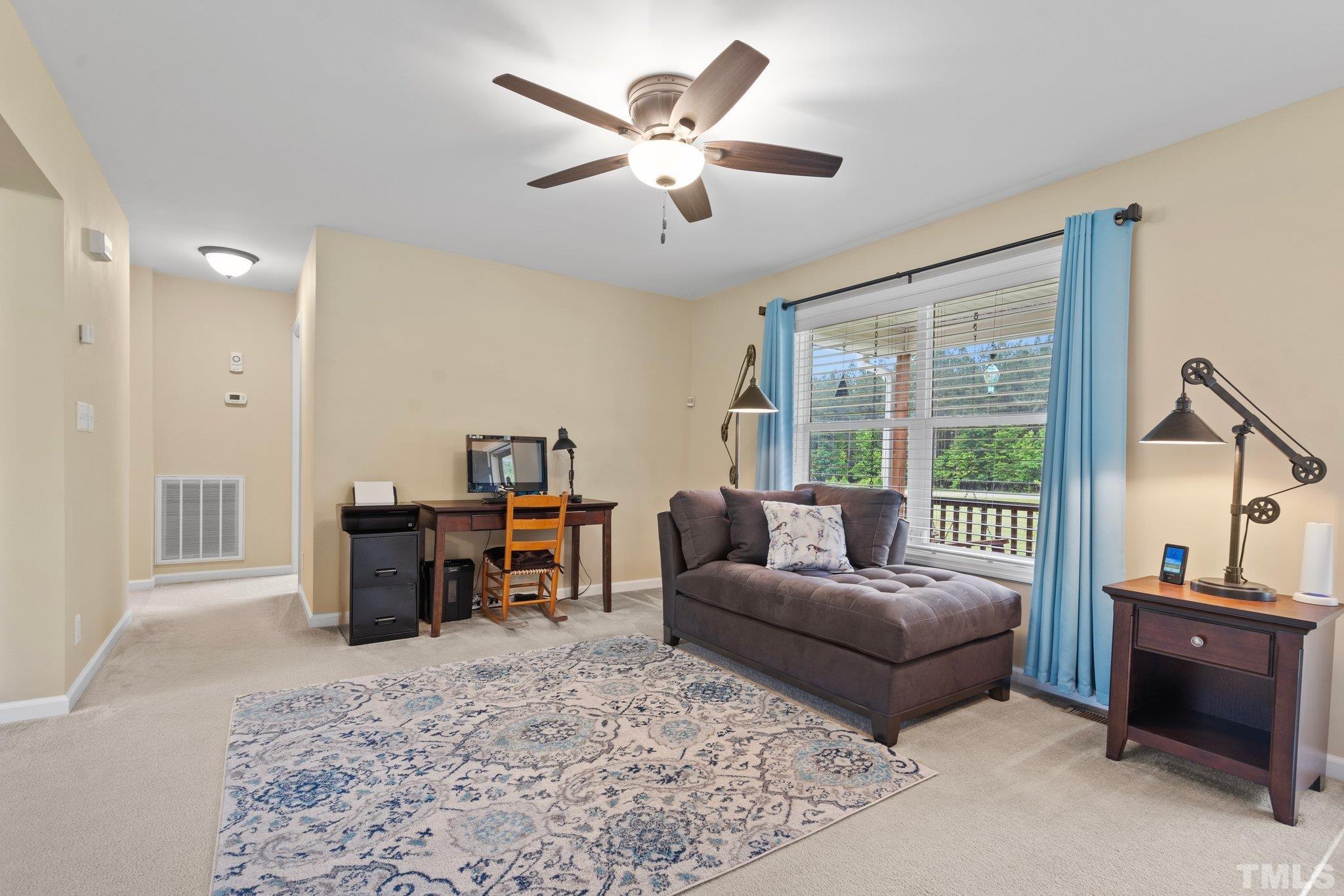 2613 Old Allensville Road Roxboro, NC 27574 - Photo 7 of 35 a living room with furniture and a flat screen tv