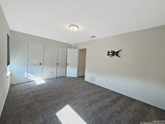a view of house with backyard and wooden tub