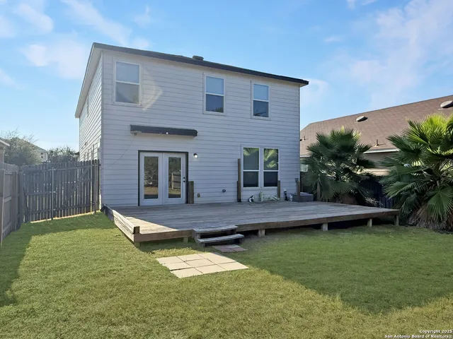 a view of a yard with an outdoor space