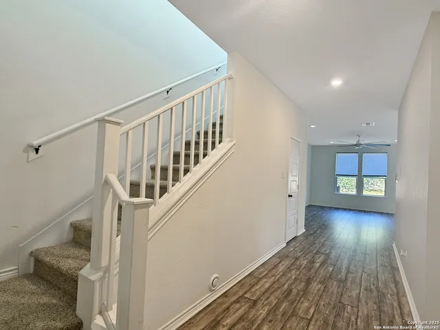 a view of entryway with wooden floor