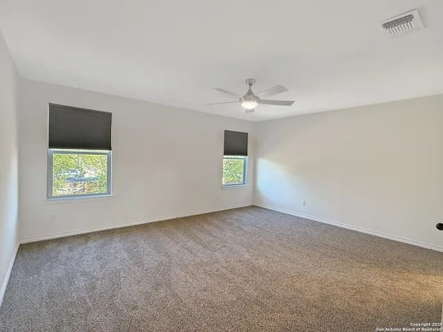 a view of an empty room with window