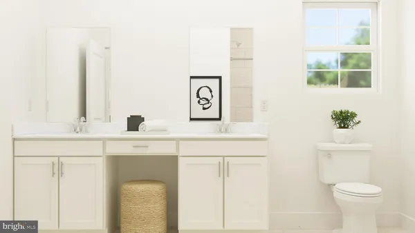 a bathroom with a mirror and a shower