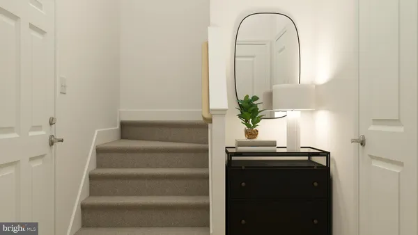 a kitchen with a sink stove and white cabinets