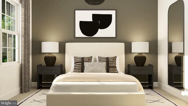 a bedroom with furniture and a window